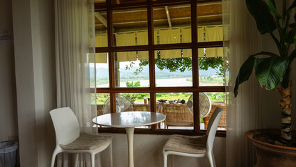 Empty chairs and table at cafe, nobody