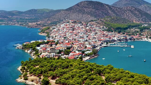 Aerial view of the town and marina of Ermioni, Peloponese, Greece, during a summer day