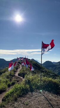 Indonesian flag flying along a trail to the summit of Mount Bismo, Central Java, Indonesia, to represent a celebration of Indonesia's Independence Day, which falls on August 17th.