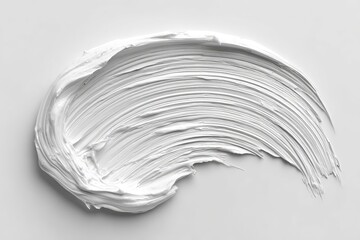White cosmetic smear on light background