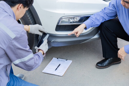 Garage small business or car insurance, Mechanic discussing auto repair details with customer, professional service consultation representing trust, technical explanation and client relationship - Powered by Adobe