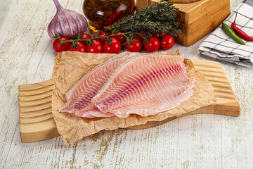 Raw Tilapia fish fillet slice