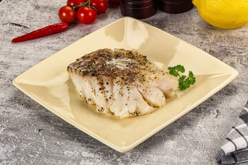 Baked cod fish fillet with spices