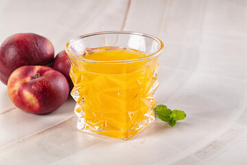 Vitamin beverage - peach juice glass