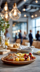 Healthy breakfast spread of pastries and fresh fruit on a wooden platter, in a bright office setting.