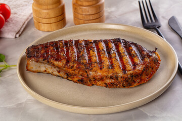 Grilled pork steak with bone