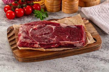 Gourmet raw rib eye steak