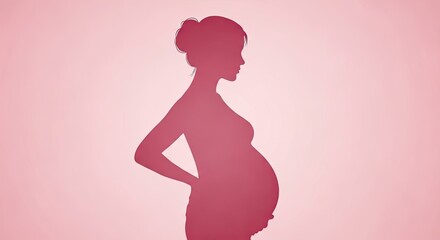 Silhouette of a pregnant woman in profile on a soft pink background representing motherhood