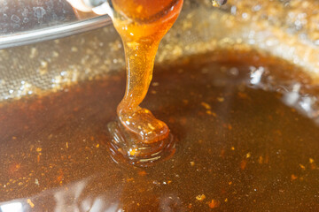 beekeeping honey production from bees in hives in the countryside italy