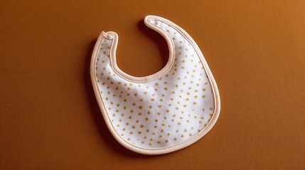 Fototapeta premium Soft Baby Bib with Minimalist Pattern and Snap Closure for Infants