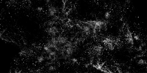 Obraz premium Abstract white dust particles on black background. Cosmic star texture overlay. Modern creative grunge vector illustration for space wallpaper.