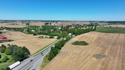 Aerial Piaseczno Poland Church Nativity 1. Northern Poland. Crops, wheat, barley, grain, potatoes and corn. Agricultural equipment. Vistula River, Lake, forest and farm rural area and landscape. 