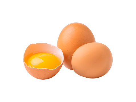 A broken egg yolk alongside an unbroken whole chicken egg
