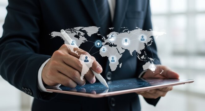 Businessman using tablet with global network and people connection