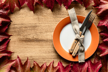 Rustic Thanksgiving Table Setting with Leaves and Plate