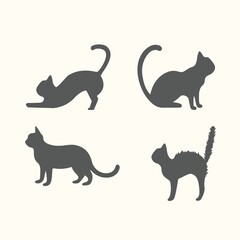 Silhouettes of four cats in different poses: stretching, sitting, standing, and scared.