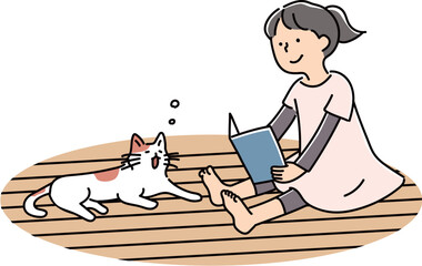 フローリングの上で裸足で寛ぐ女の子と猫（床暖房）