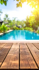Wooden deck overlooking a pool in a tropical setting