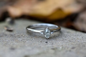 Close-up of engagement ring during emotional proposal.