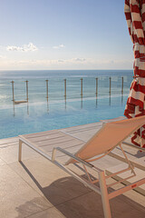 Infinity pool on the bright summer day