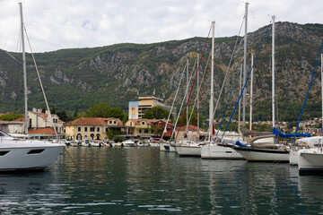 mall boats moored in the port of Kotor, Montenegro.