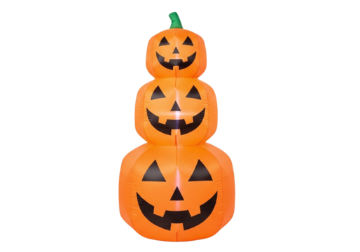 Inflatable stacked pumpkins with carved faces isolated on transparent background