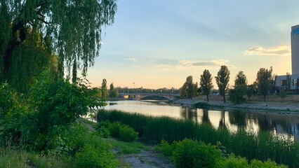 Sunset over the river in the city of Kiev. Rusanivka