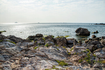 rocks on the beach and endless sea views 