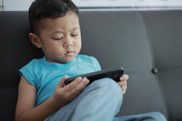 boy playing video game