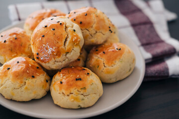 turkish savory pastry pogaca with dill and black sesame or cumin, homemade quick snack
