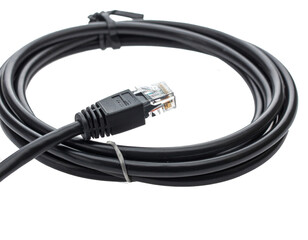 Ethernet cable isolated on white background, clearly displayed, showcasing the connector, cord, and insulation. Essential for networking, internet connectivity, data transfer, and communication, empha