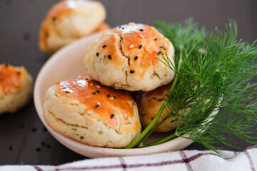 turkish savory pastry pogaca with dill and black sesame or cumin,