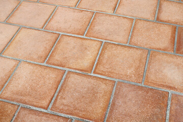 Fototapeta premium Dallage carrelage en terre cuite, tomette ancienne