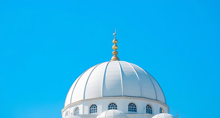 white mosque dome against clear blue sky background