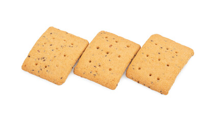 Whole grain crackers with flax and sesame seeds isolated on white background. Dry salted cracker cookies. Snack. Gluten free crackers