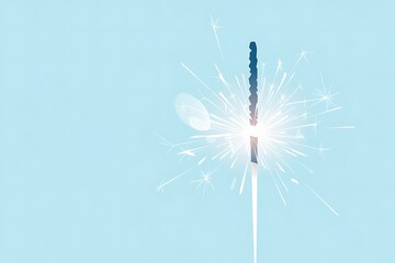 Obraz premium Sparkler ignites with bright white sparks on light blue background