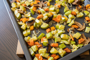 oven roasted vegetables zucchini carrots mushrooms fall rustic dish close up