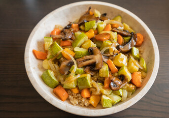 vegetarian quinoa bowl with zucchini carrots mushrooms roasted fall food