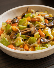vegetarian quinoa bowl with zucchini carrots mushrooms roasted fall food