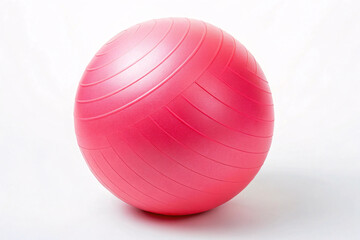 Pink exercise ball with horizontal ridged lines sitting on white background, designed for fitness workouts, physical therapy and core strength training.