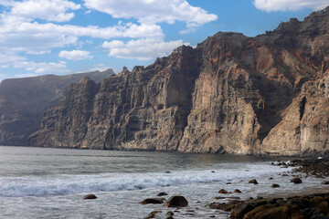 Panoramic view of the huge rock cliffs of Los Gigantes in Tenerife, Canary Islands, Spain.