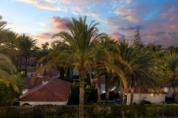 Sunset at a tropical bungalow resort in Gran Canaria, Canary Islands, Spain.