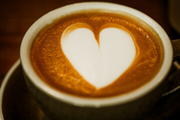 Cups of coffee decorated with a heart