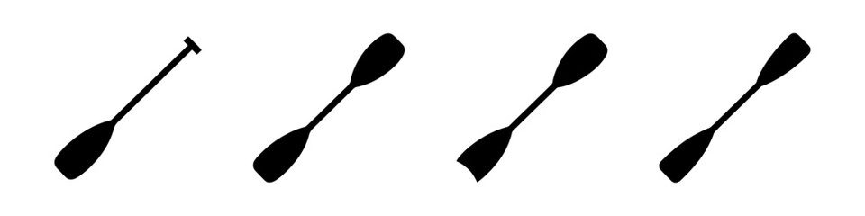 silhouette of rowing oars showcasing motion of paddling through water