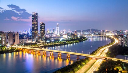 Naklejka premium City skyline illuminates the Han River in Seoul, South Korea, showcasing modern architecture and vibrant urban life at twilight, creating a captivating cityscape.