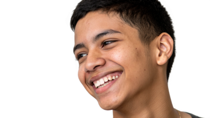 Close up portrait of a young man smiling with short dark hair and looking off to the side on a black background