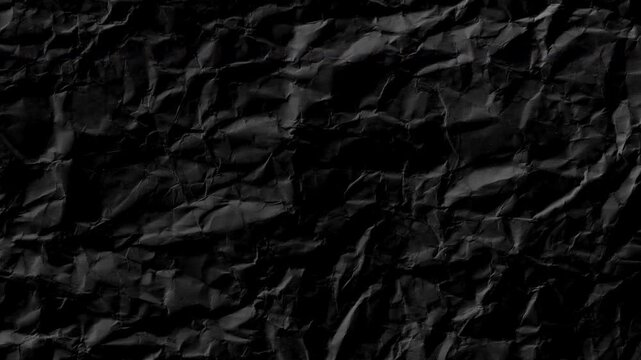 Black crumpled paper,Seamless looping background texture,Paper texture stop motion animation	