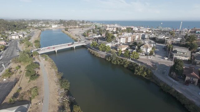 Santa Cruz California RAW Drone Footage of San Lorenzo River and Bridge with Coastal Cityscape, Pacific Ocean, Boardwalk, Beach, Tourism, Urban Planning, Travel Stock Video in LOG DLOG Ungraded