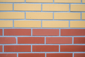 Red and yellow brick wall contrast