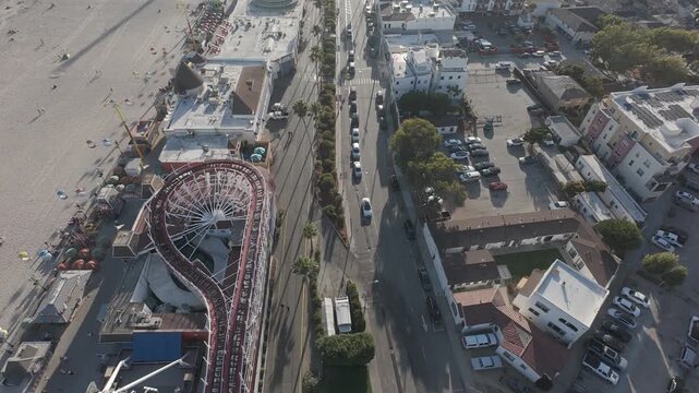 Santa Cruz Beach Boardwalk RAW Aerial in LOG/DLOG/DNG &mdash; Top-Down View of Wooden Roller Coaster, City Street, Parking Lots and Oceanfront | California Seaside Ungraded Footage for Color Grading, Travel